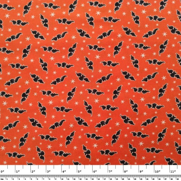 Orange Tossed Bats Glow in the Dark Fabric